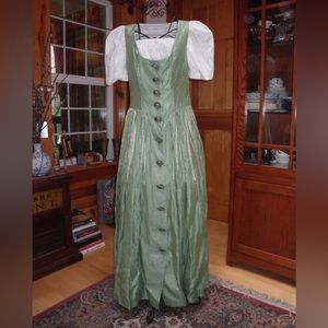 New charming Ladies fine dress. Beautiful designer fabric and buttons.